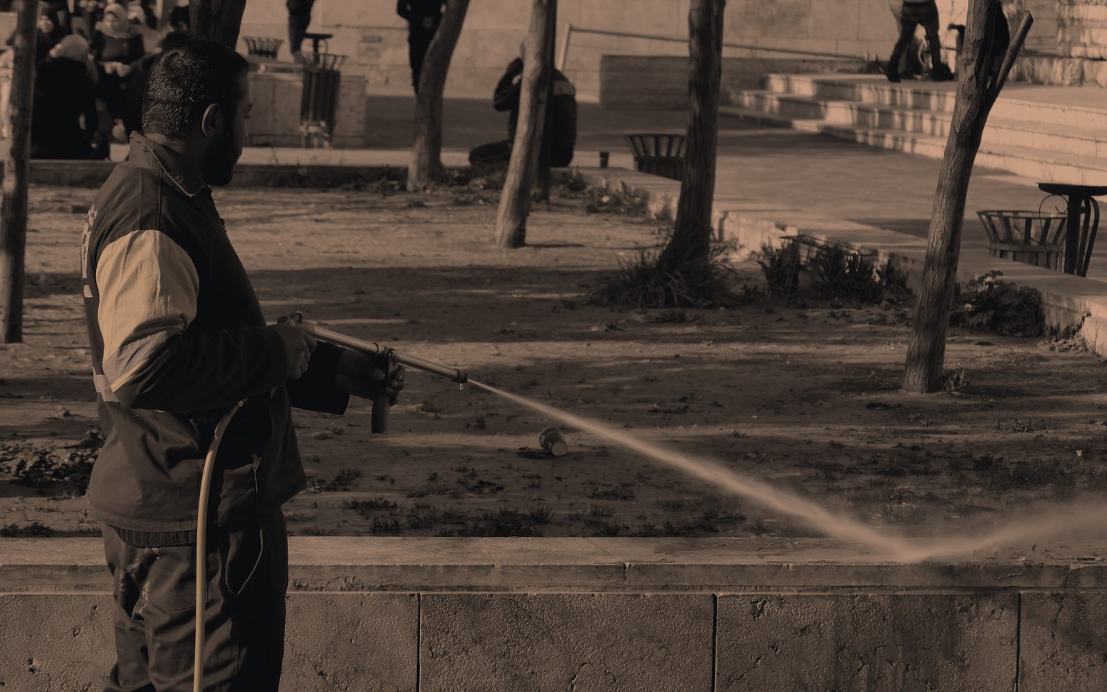 Pressure washing a concrete surface